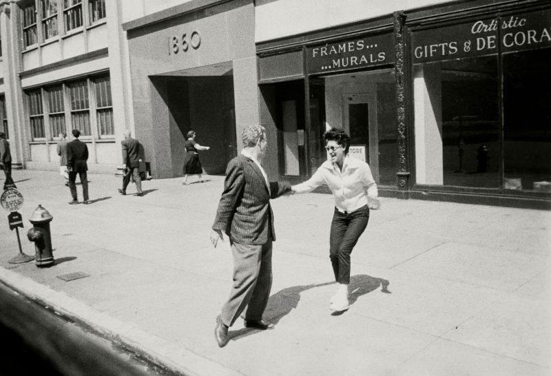 'From the Bus NYC' (Woman and Man on the Sidewalk) Lot Sold  63,500 USD, Альбом: «On the Road» by Robert Frank from the Collection of Arthur S. Penn